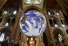 Luke Jerram's Gaia artwork, suspended above the nave crossing. Photo: David Lowndes